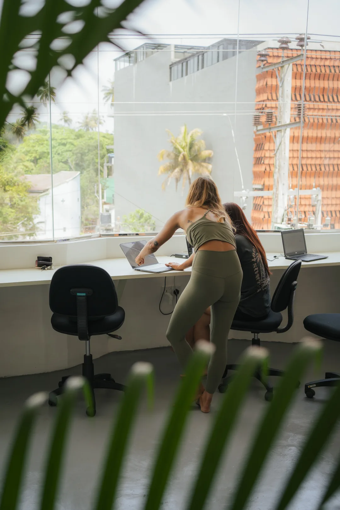 Window desks overlooking the jungle at MiRA Mirissa coworking