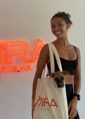 The MiRA Mirissa neon sign, a tote bag and a short-stay puppy