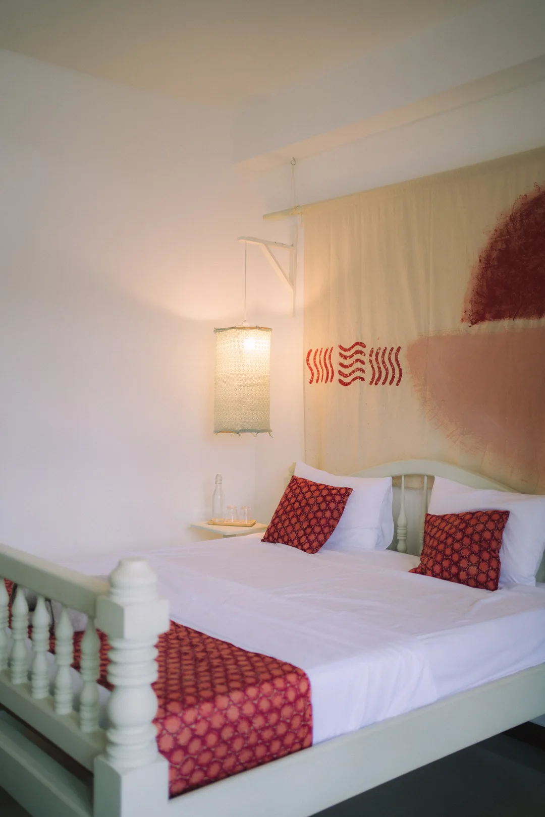 Private room at MiRA Mirissa with double bed and brand textiles