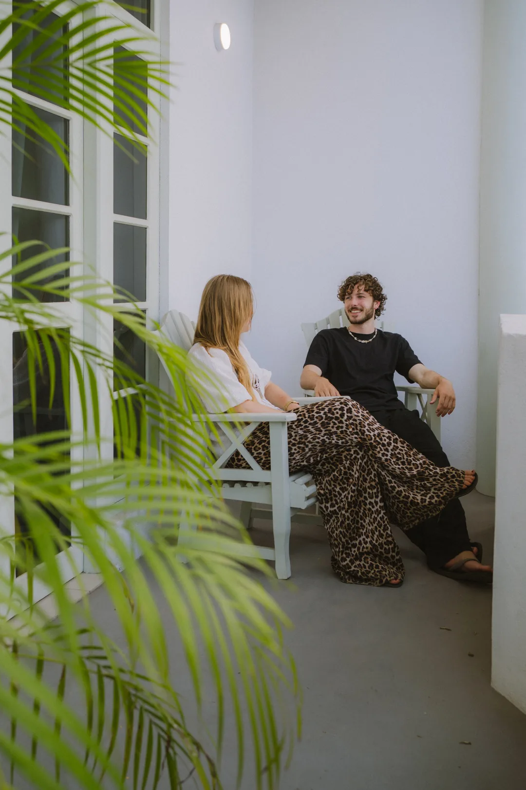 Guests on the balcony of a private room at MiRA Mirissa